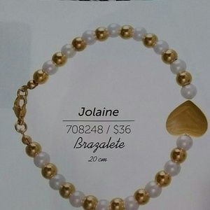 Pearl and gold tone metal bracelet